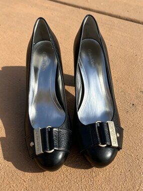 Calvin Klein Black Leather Block Heel Pumps with Buckle & Logo Accent, Round Toe